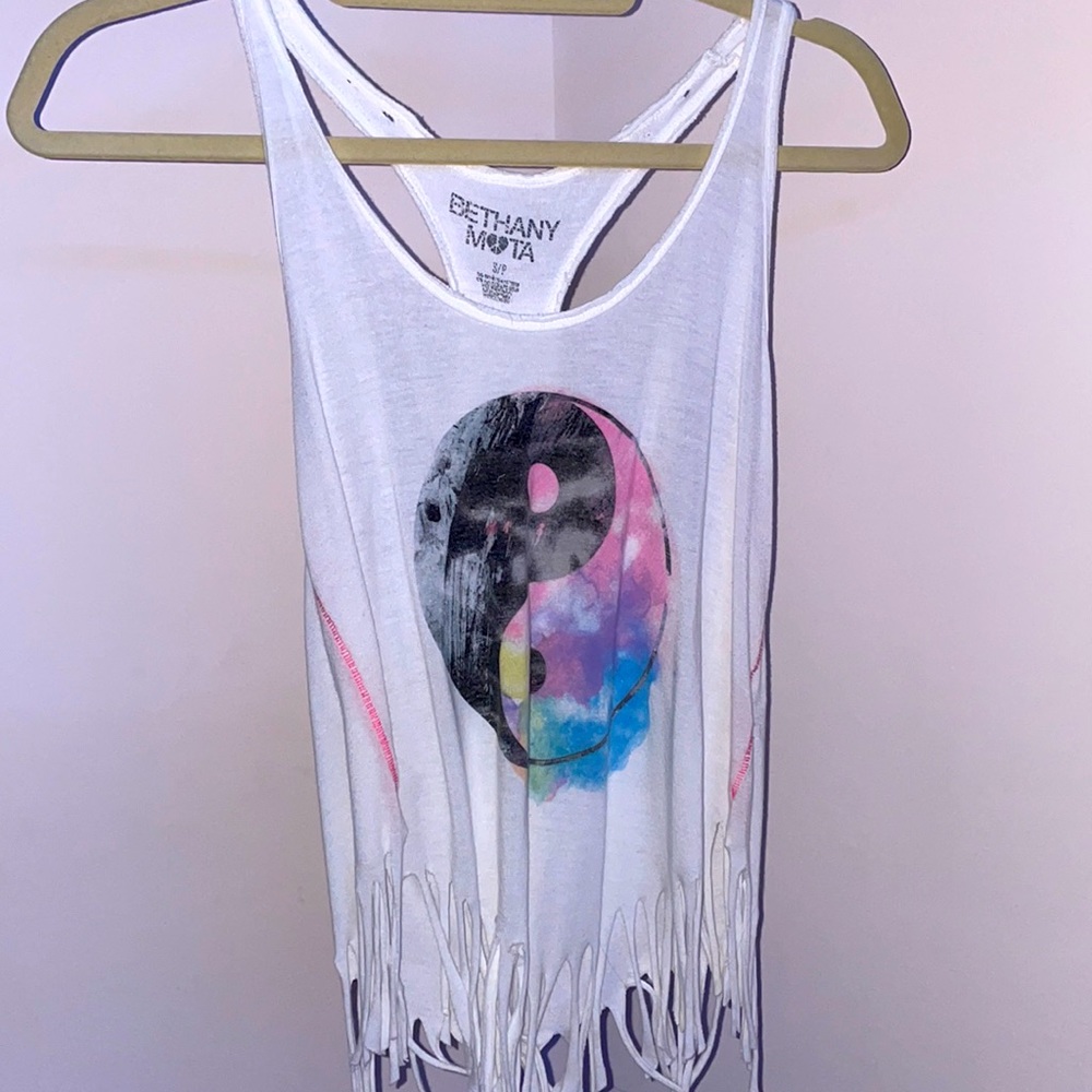 Colorful Yen-yang, white tank top, fringe bottom